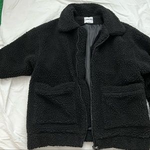 Fits oversized, XS, but fits XS/S depending how oversized you like it